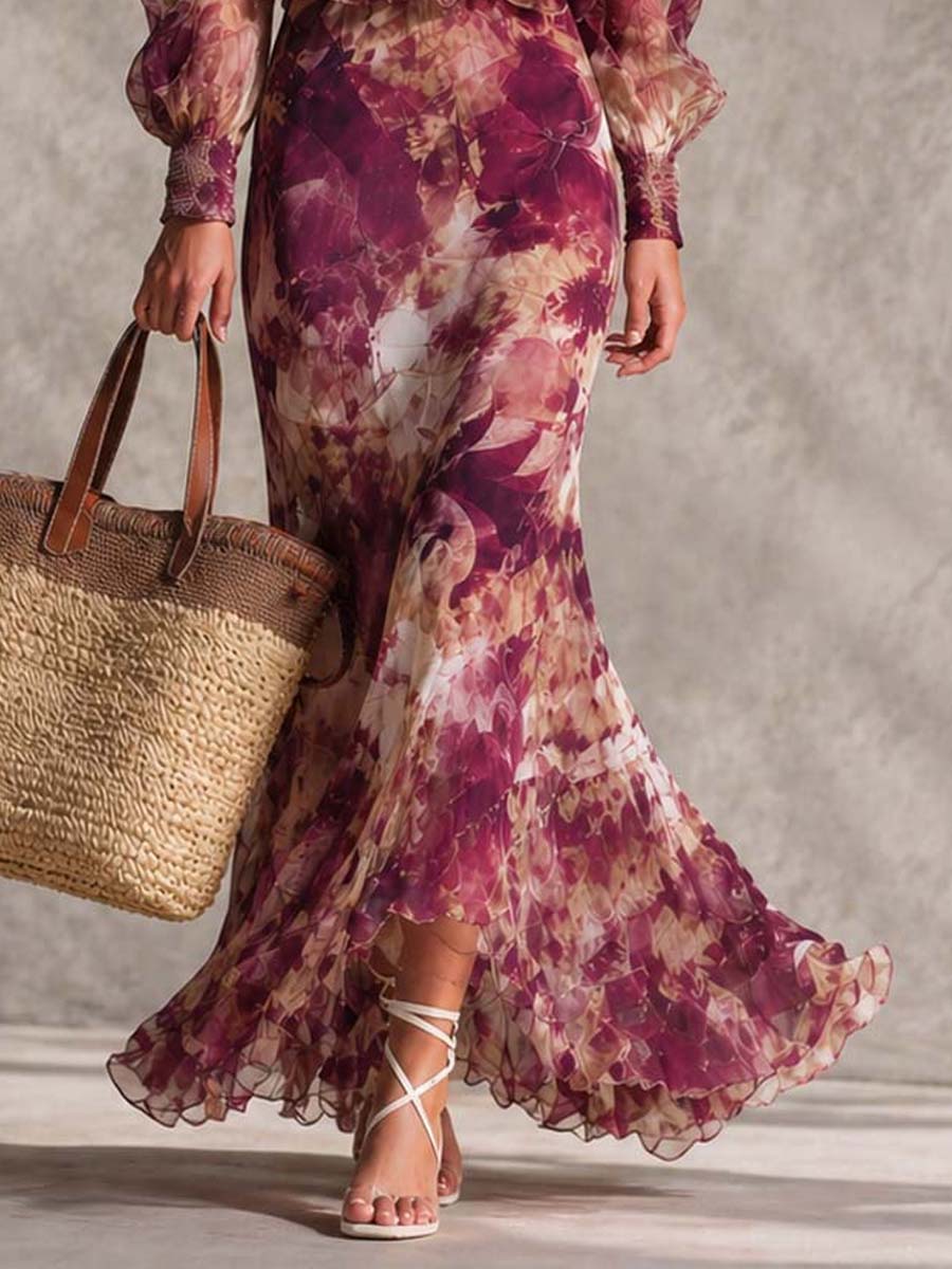 Robe longue rose rose pâle à fleurs, décolleté en bateau, en chiffon léger, par Danoir Paris, vue de face sur mannequin.