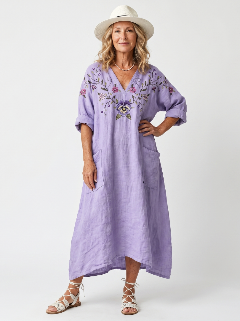 Robe midi oversize Danoir Paris avec poches et broderie florale, vue de face, en tissu léger et fluide.