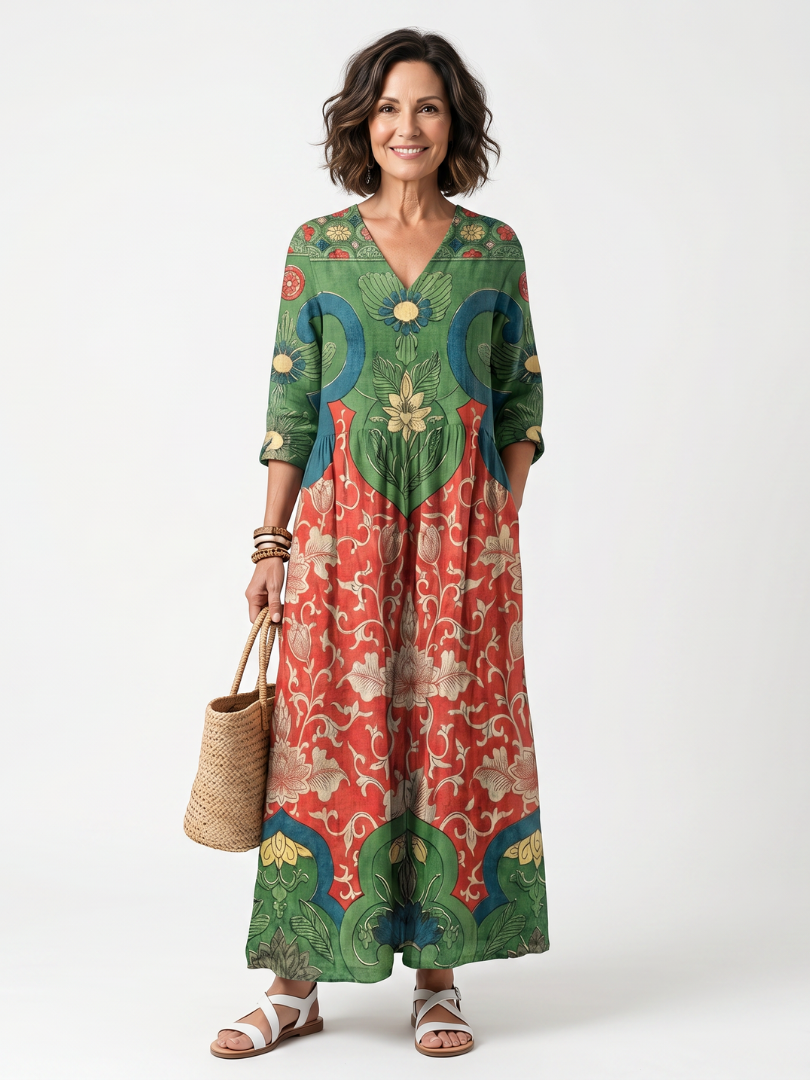 Robe midi Danoir Paris Sloane à imprimé mixte, col en V et poches, portée élégante pour femme.