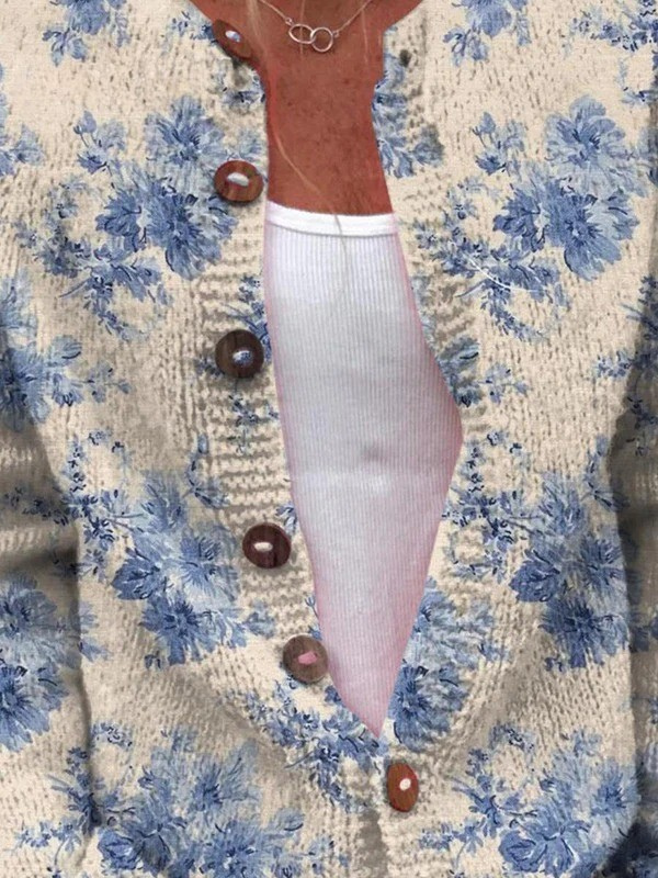 Cardigan vintage en maille Daysie™ de Danoir Paris, pull en tricot avec manches longues et détails classiques.