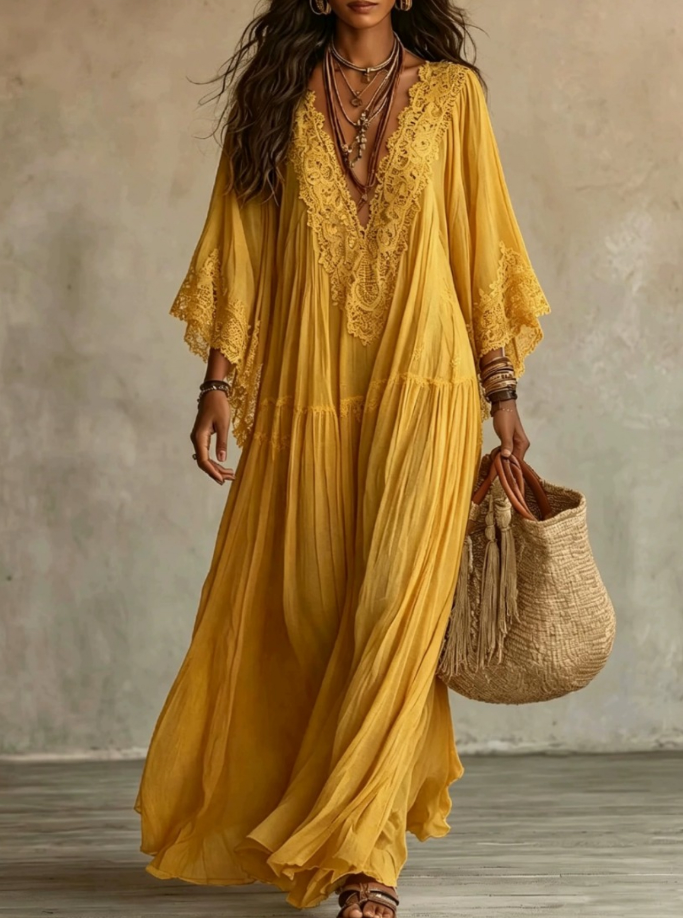Robe longue en chiffon ivoire et dentelle Danoir Paris, élégante robe de soirée avec détails en dentelle.