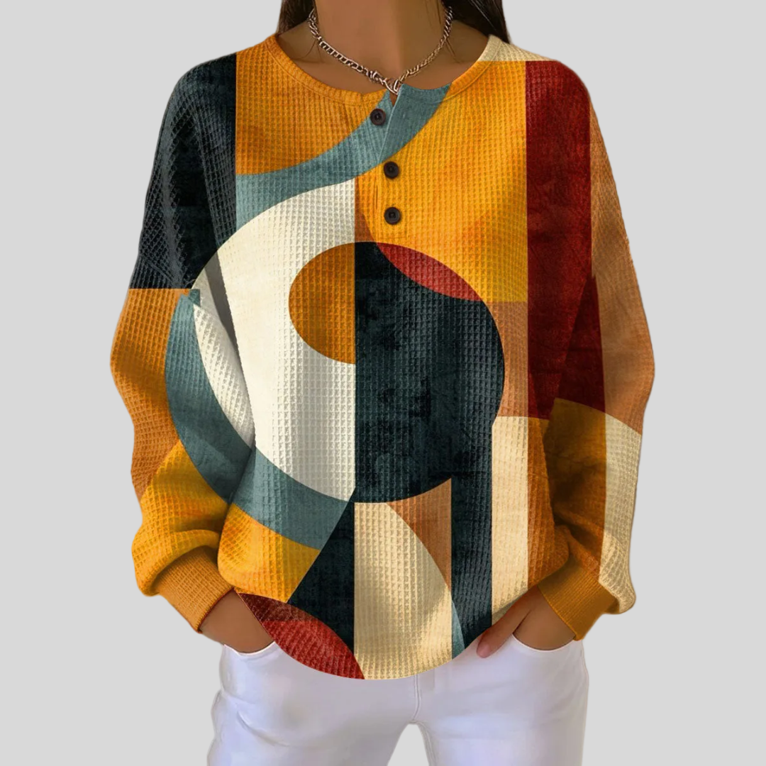 Sweat-shirt à imprimé géométrique Danoir Paris, modèle Marla, en coton gris avec motifs modernes, porté sur mannequin.