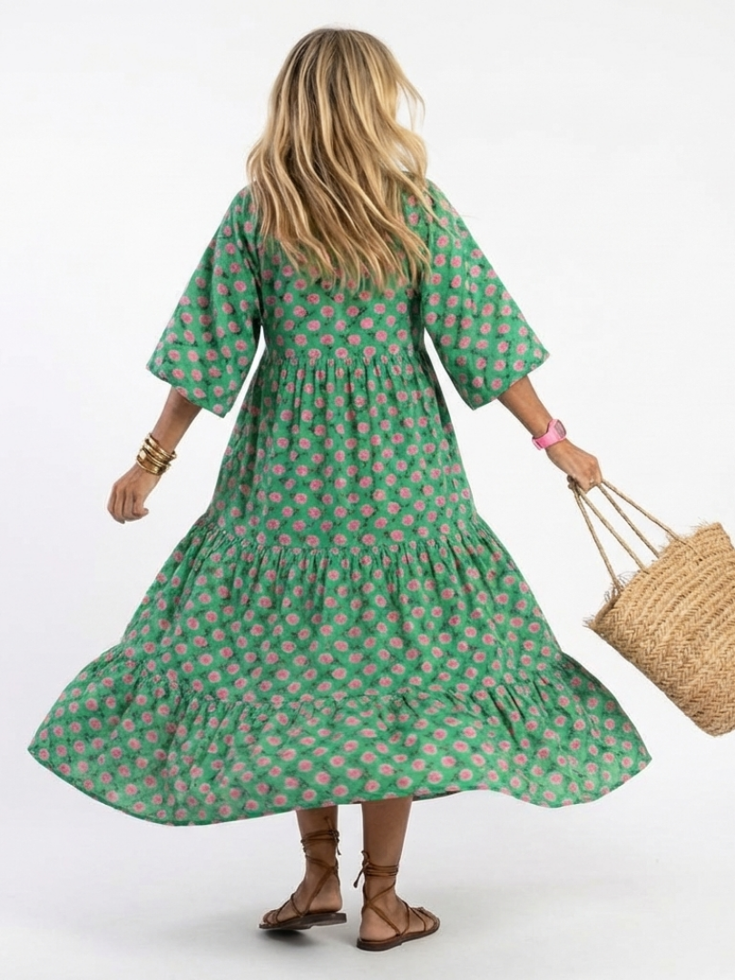 Robe midi Danoir Paris Fiora à motifs floraux avec décolleté en V, tissu léger et élégant pour femme.