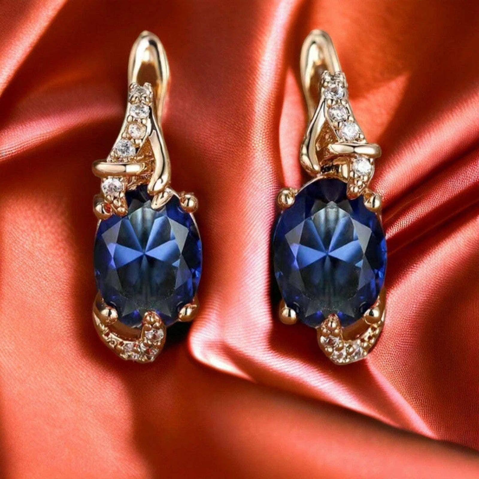 Boucles d'oreilles Regal Midnight de Danoir Paris, élégantes boucles d'oreilles en métal avec pendentifs noirs raffinés.