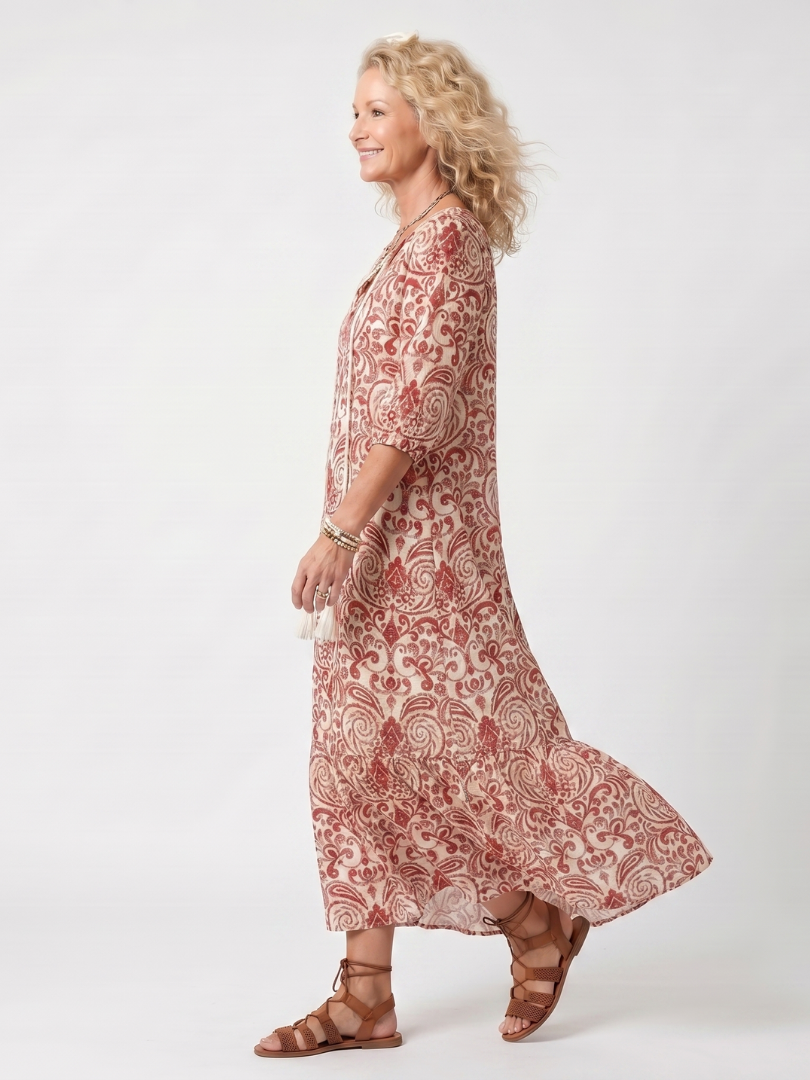 Robe midi Danoir Paris Noelle à motif ornemental avec franges et liens, tissu fluide et style élégant.
