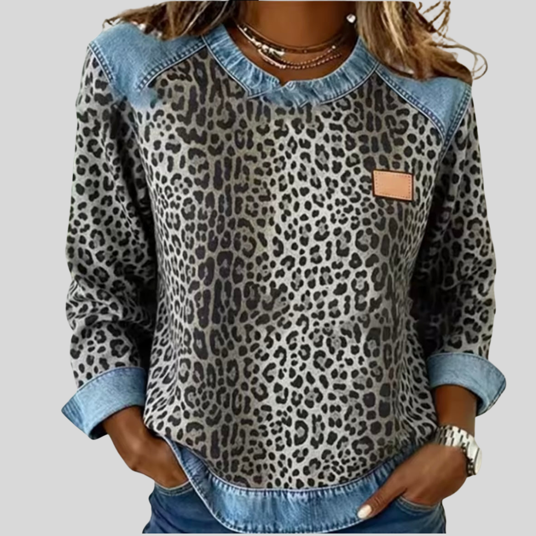 Pull Danoir Paris Darlene à imprimé animaux avec détails contrastés, manches longues et coupe confortable.