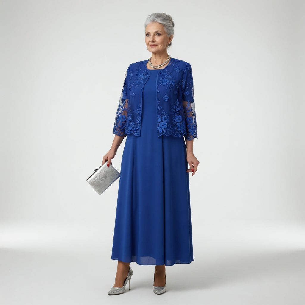 Robe longue formelle élégante Nerina de Danoir Paris en tissu bleu, avec coupe sophistiquée et détails raffinés.