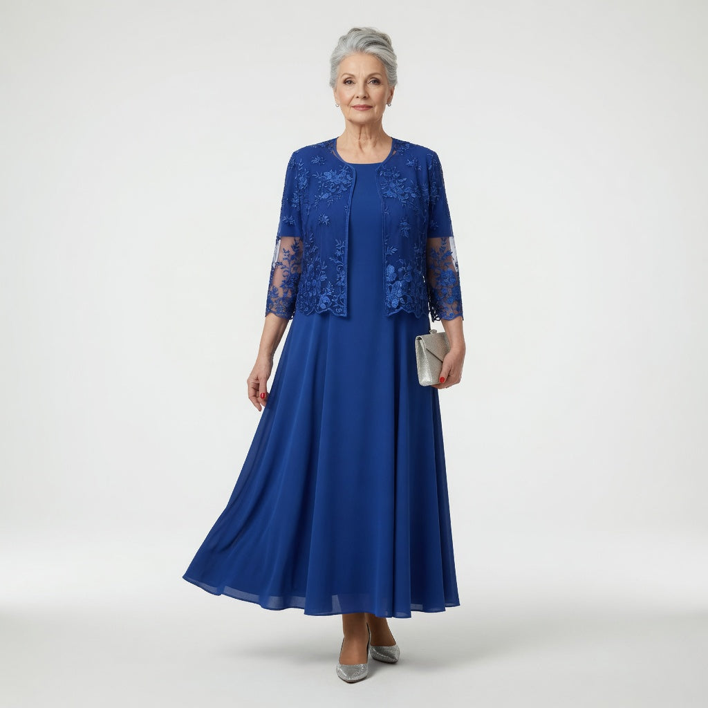Robe longue de soirée élégante Nerina par Danoir Paris en tissu bleu, avec coupe fluide et détails sophistiqués.