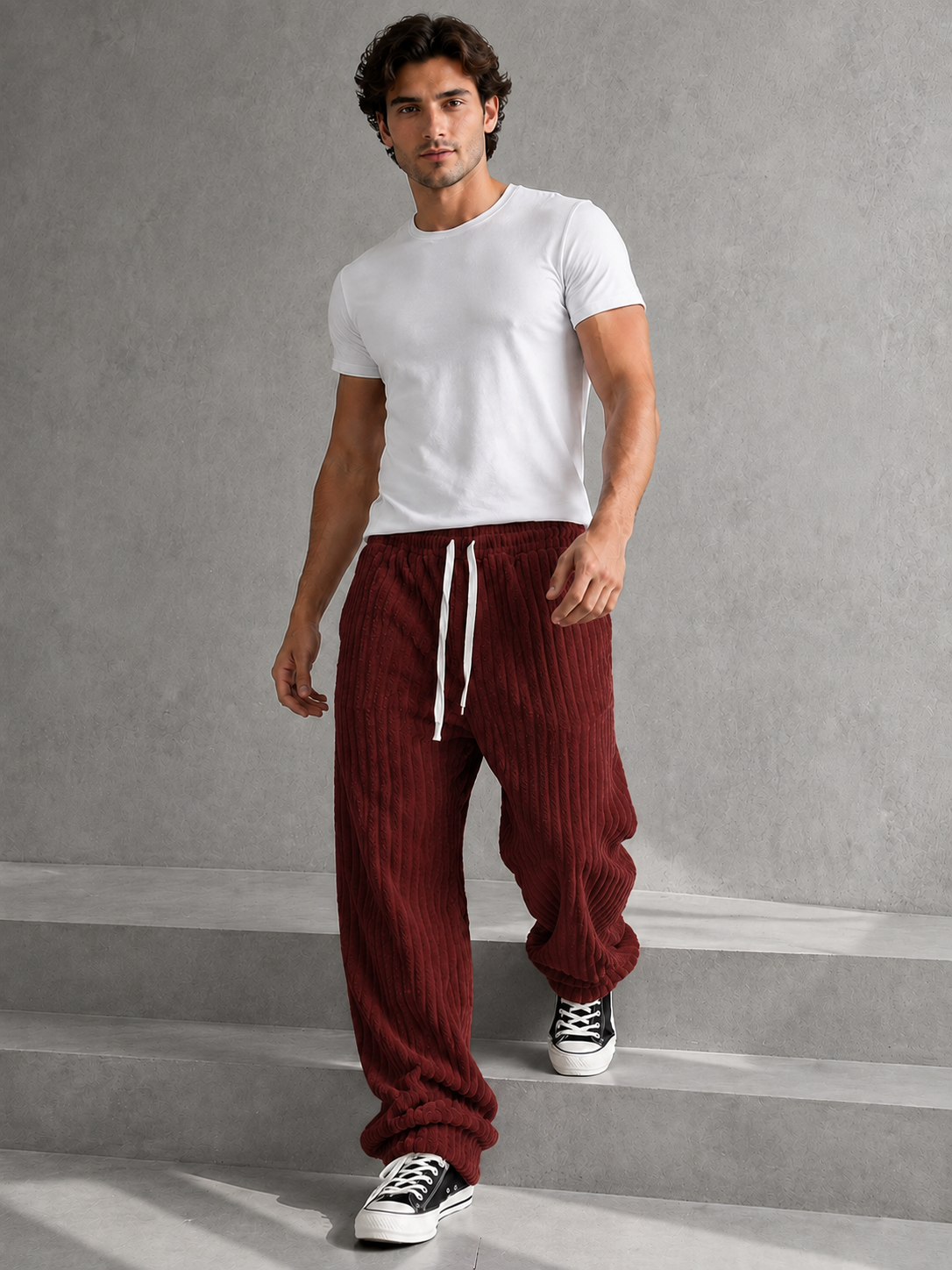 Pantalon Rowan de Danoir Paris en tissu noir, coupe élégante avec ceinture et poches visibles sur l'image.