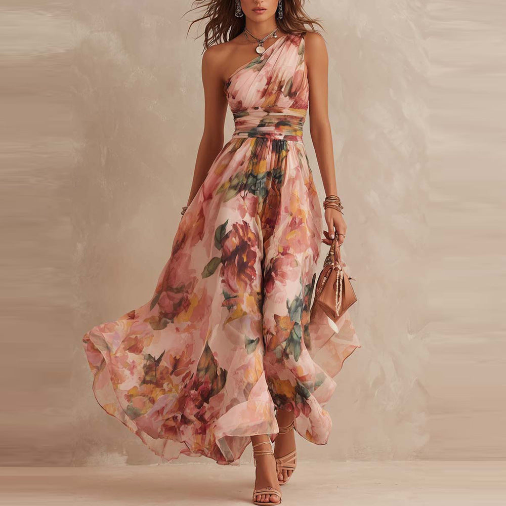 Robe longue femme Aurora de Danoir Paris avec épaules dénudées et motif floral, détail de la robe montrant le tissu élégant.
