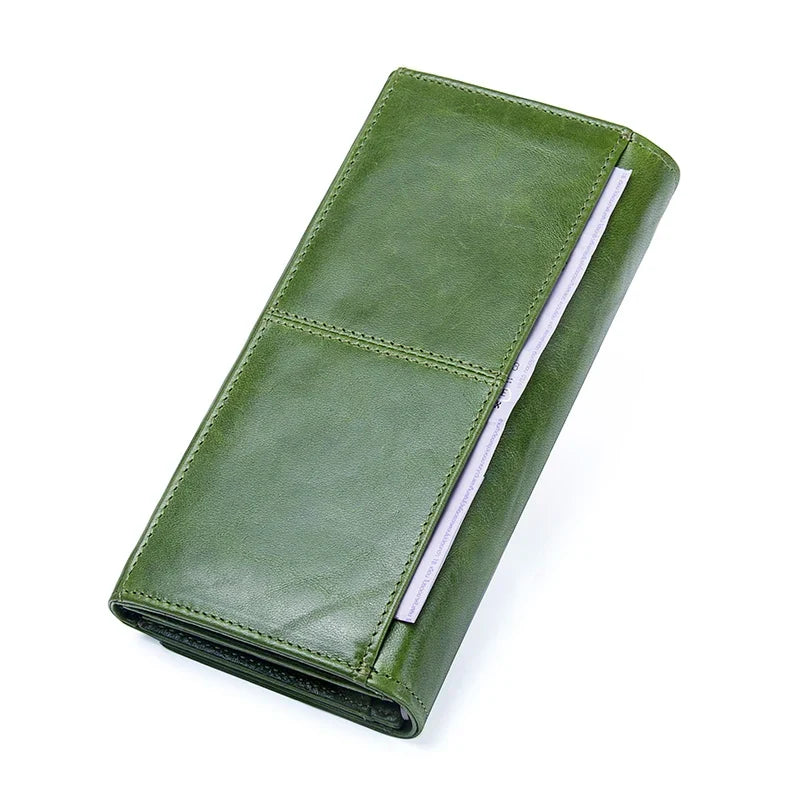 Portefeuille pour femmes en cuir véritable Danoir Paris, élégant et compact avec compartiments pour cartes et billets.