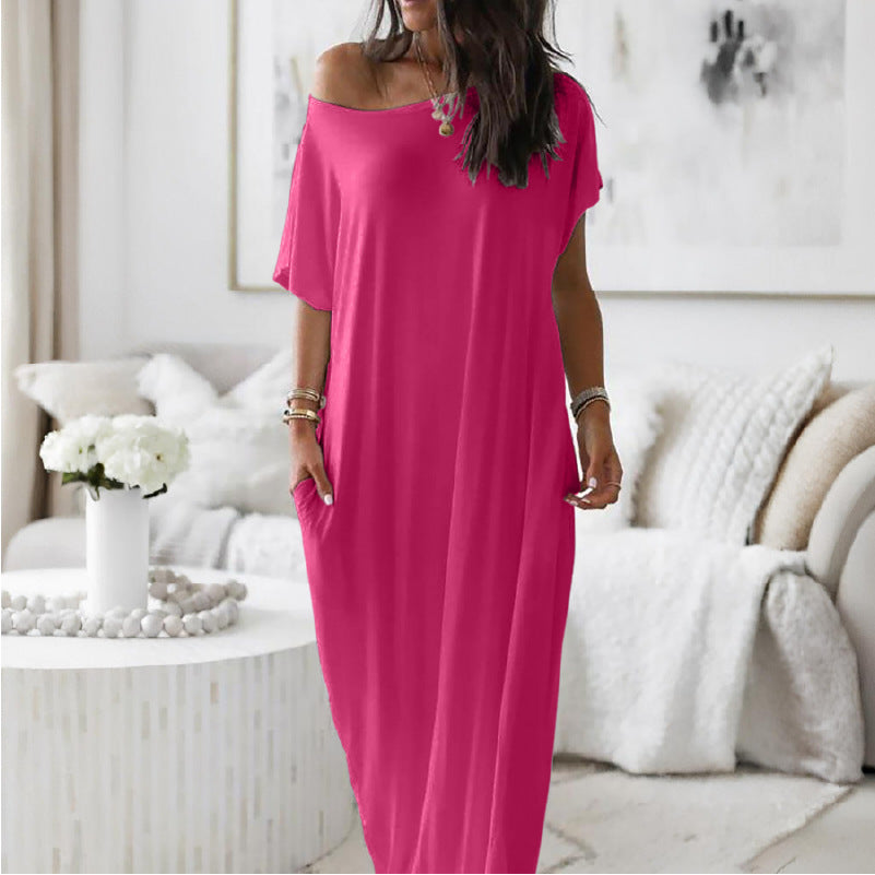 Robe décontractée oversize asymétrique à épaules dénudées de Danoir Paris, tissu fluide et style tendance.