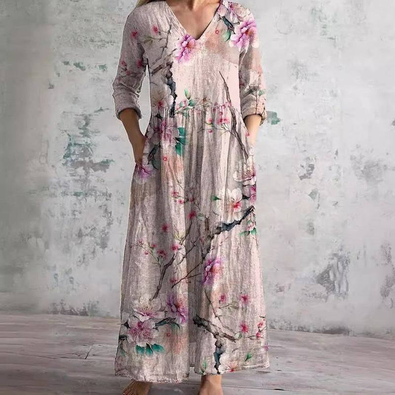 Robe d'été florale Caroline™ de Danoir Paris, tissu léger, design élégant avec motifs floraux colorés, portée estivale.