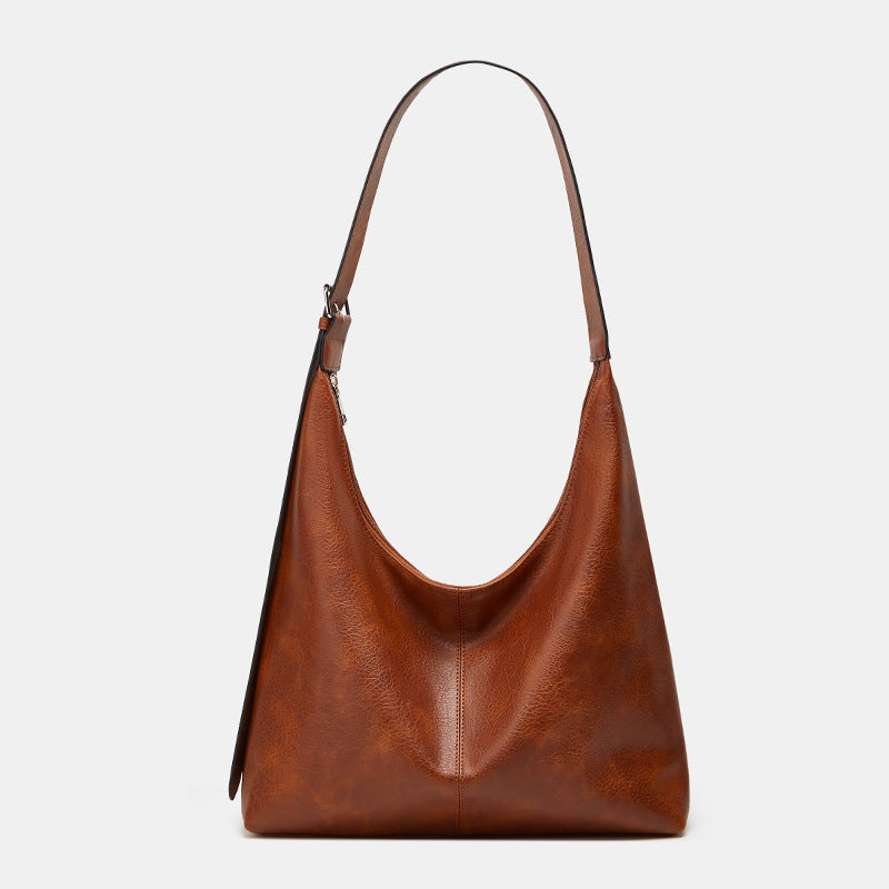 Sac à dos Danoir Paris Victoria, grand compartiment, design pratique et élégant, idéal pour un usage quotidien.