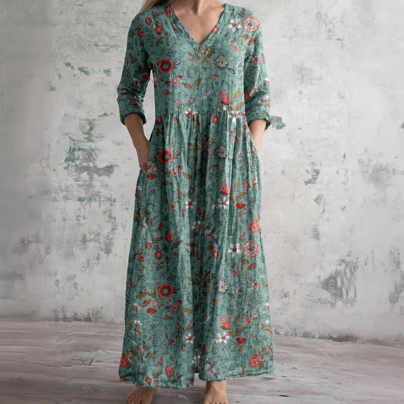 Robe d'été florale Olivia™ de Danoir Paris, tissu léger avec motif floral coloré, portée par un mannequin.