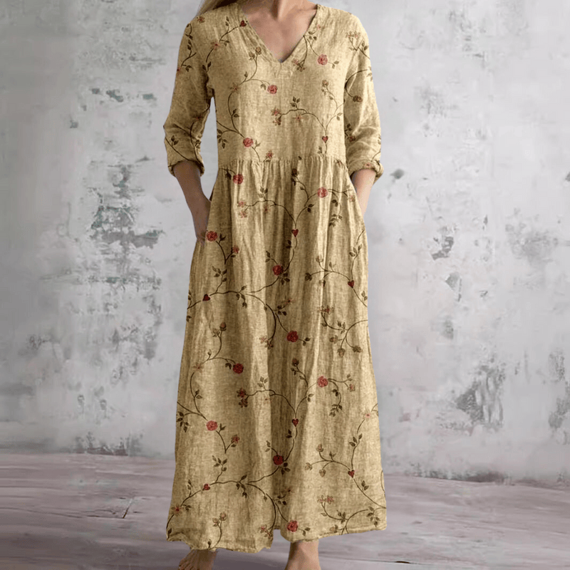Robe d'été florale Erica™ de Danoir Paris, tissu léger avec motif floral, portée sur une silhouette féminine.