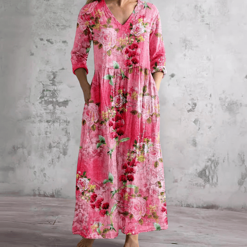 Robe d'été florale Wenda™ de Danoir Paris, tissu léger avec motif floral, manches courtes et coupe élégante.