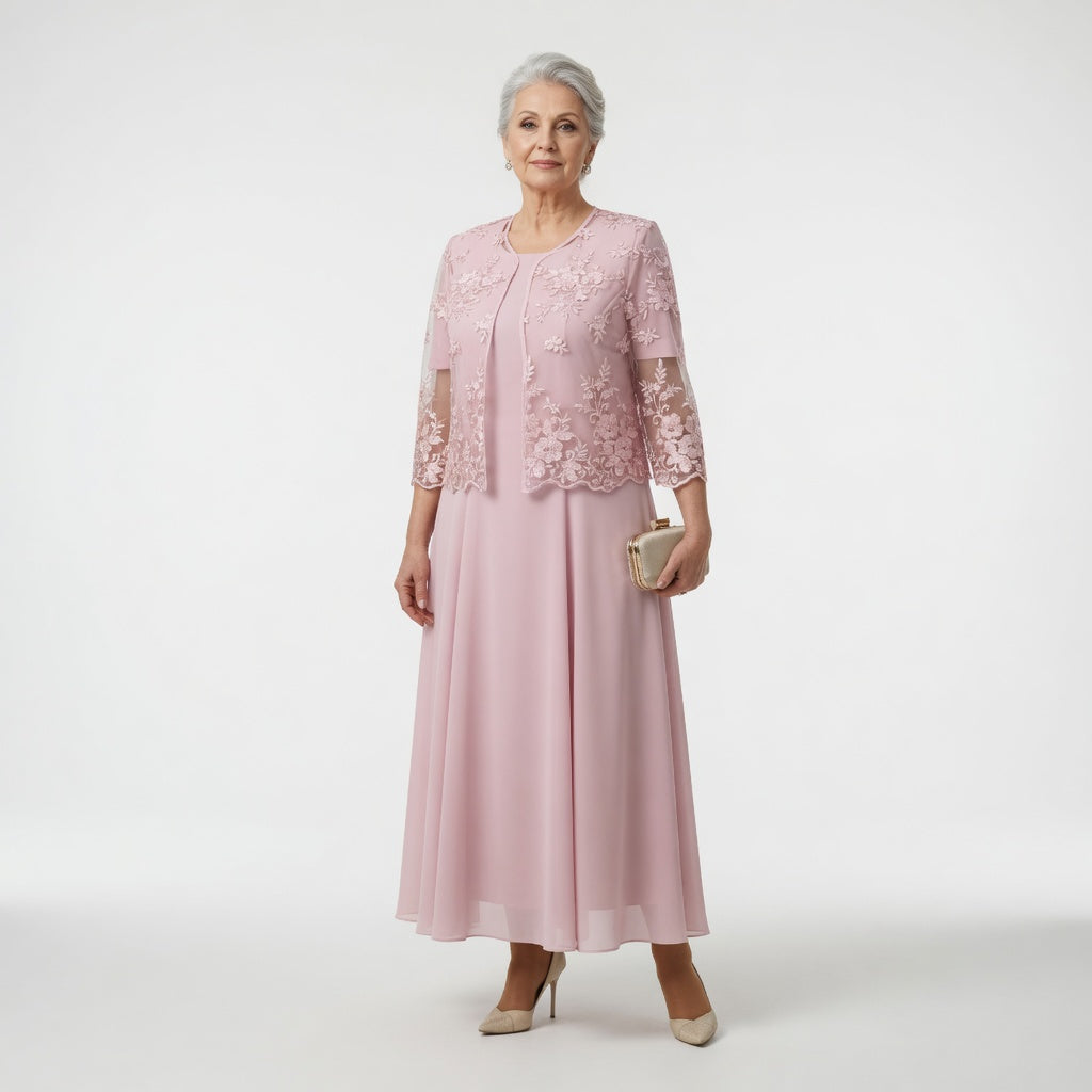 Robe longue élégante rose Nerina de Danoir Paris, style formel, tissu fluide et finition sophistiquée, portée lors d'une occasion spéciale.