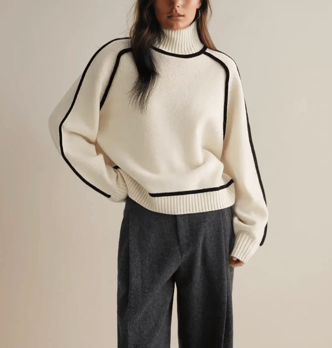 Pull roulé Céline Danoir Paris, pull à col roulé doux et élégant, porté sur un mannequin blanc, fond neutre.