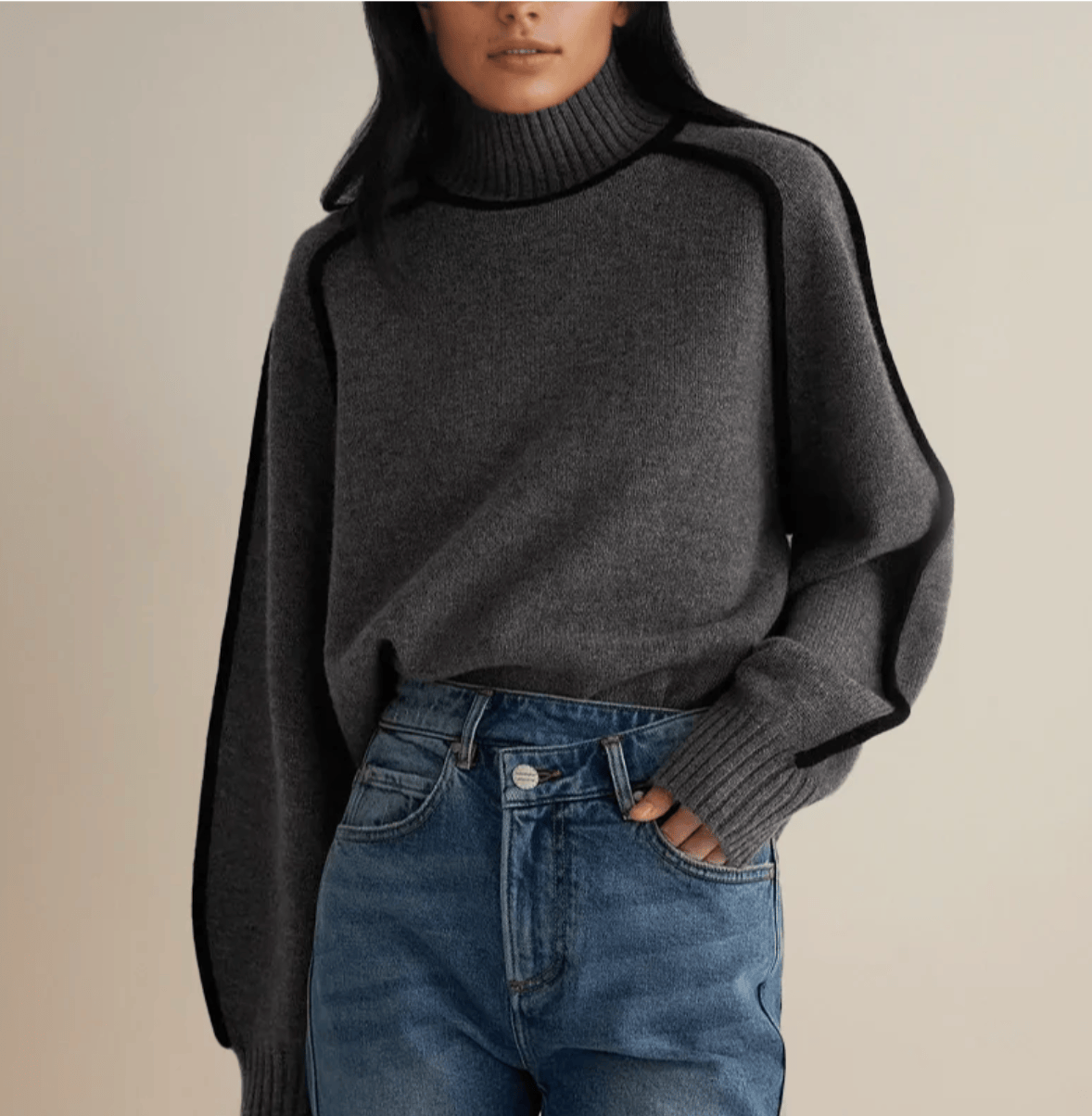 Pull roulé Céline Danoir Paris, en maille douce, couleur neutre, porté sur mannequin avec col roulé ajusté.