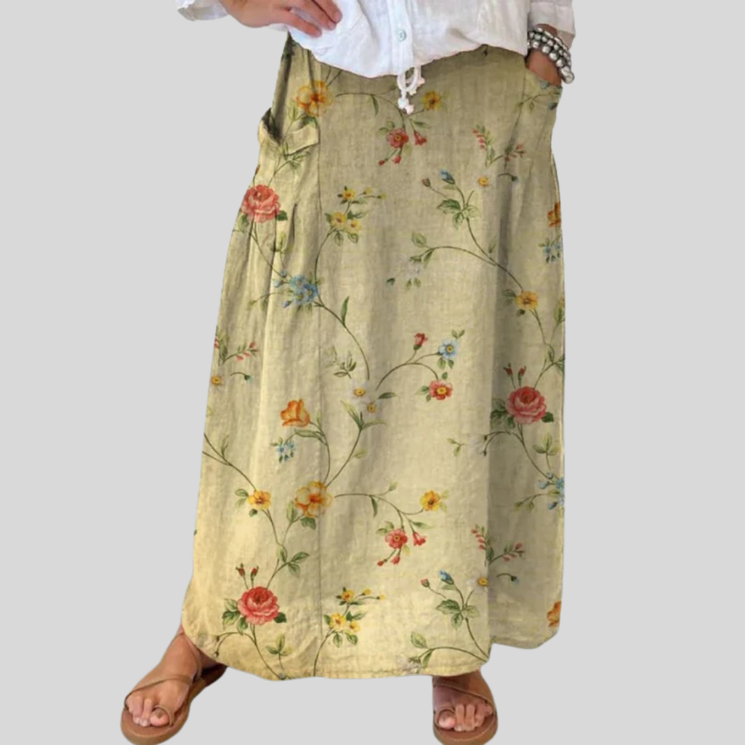 jupe élégante florale rétro Mella™ avec taille élastique et poches, fabriquée par Danoir Paris, tissu léger et design sophistiqué