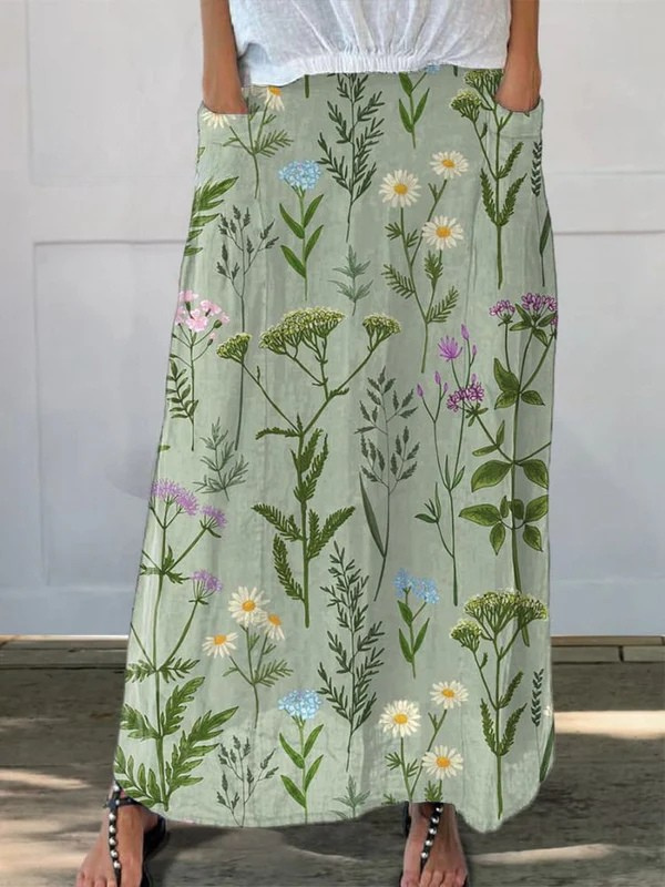 Jupe à poches Danoir Paris Gerlin™ avec motif printé floral printé sur fond printanier, tissu enrichi et style élégant.