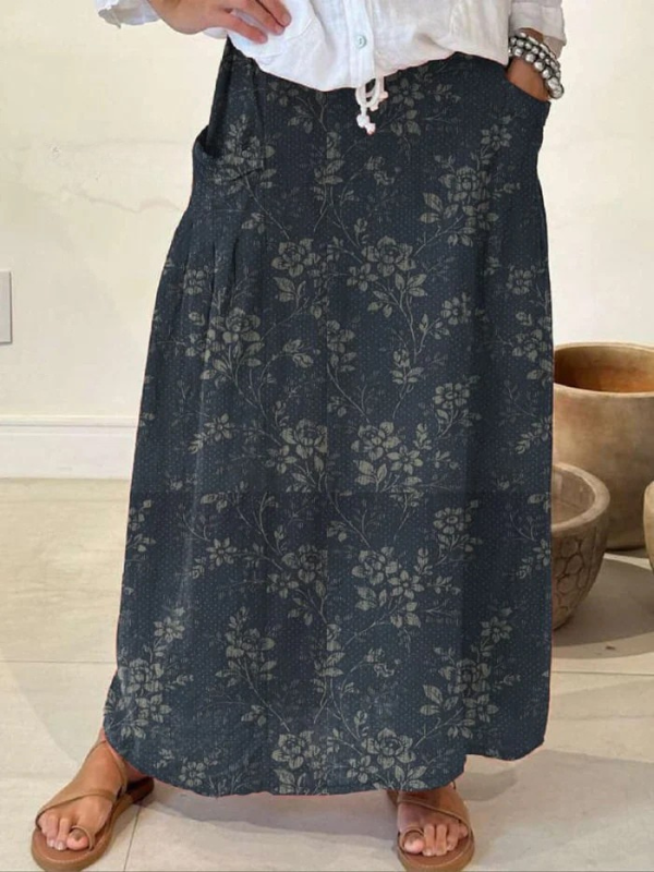 Jupe vintage à fleurs Princess™ avec taille élastique et poche, de la marque Danoir Paris, portée avec un haut blanc.