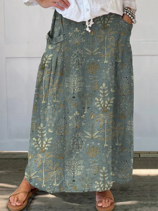 Jupe portefeuille Danoir Paris Carly Woodland avec motif végétation, taille élastique et poche, en tissu léger.