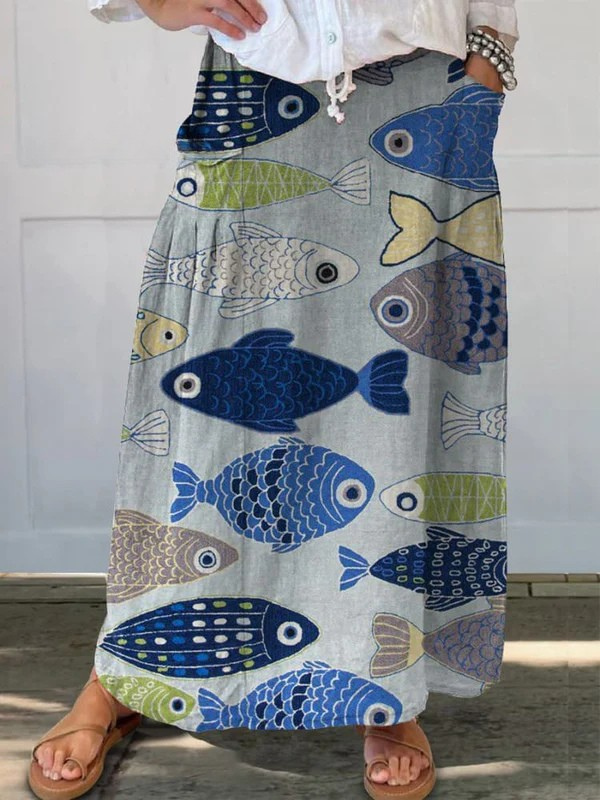Jupe portefeuille vintage Danoir Paris Trisia™ avec motif d'illustration de poissons élégants et colorés.