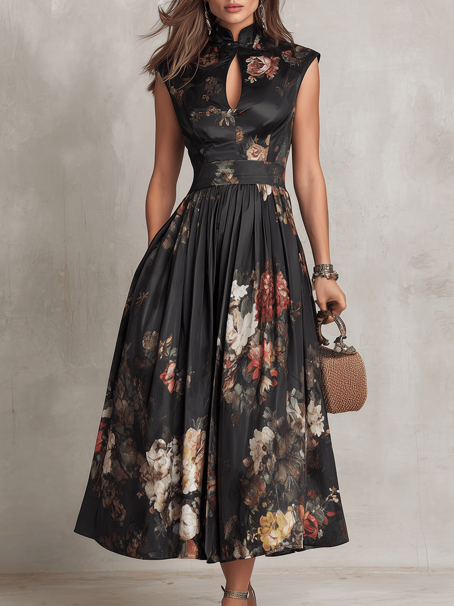 Robe midi en satin noir à col clé et motif floral, plissée, de la marque Danoir Paris.