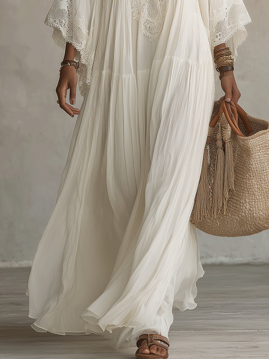 Robe longue en chiffon ivoire et dentelle Celeste par Danoir Paris, détail du tissu léger et broderies délicates.
