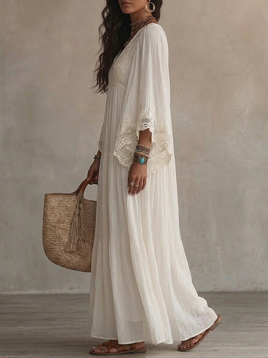 Robe longue en chiffon ivoire et dentelle Danoir Paris, silhouette élégante et détails délicats pour une occasion spéciale.