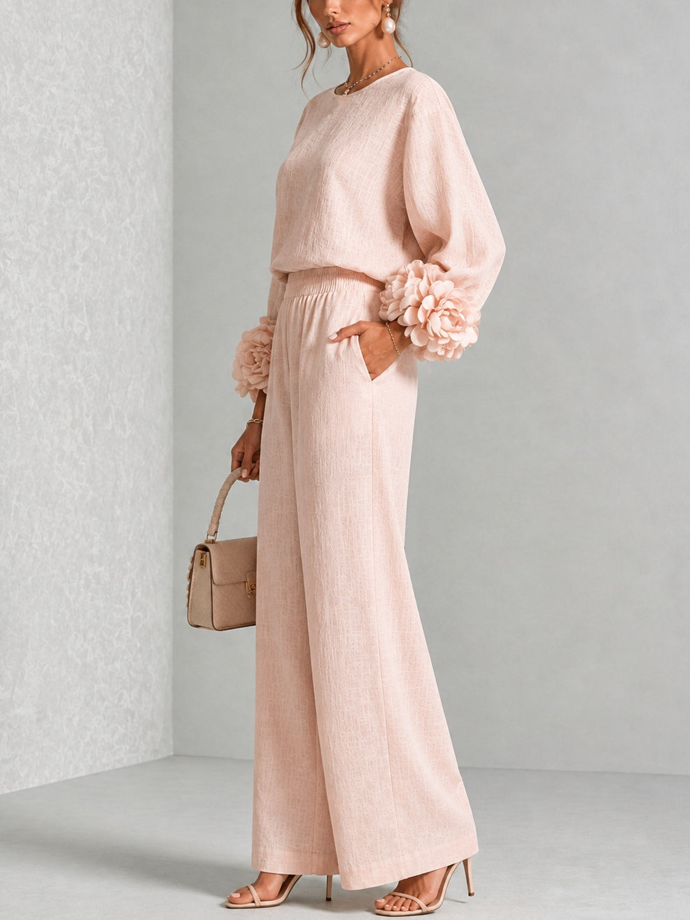 Ensemble deux pièces Danoir Paris avec manches florales, vêtement rose élégant et féminin, vue de l'ensemble sur un fond neutre.