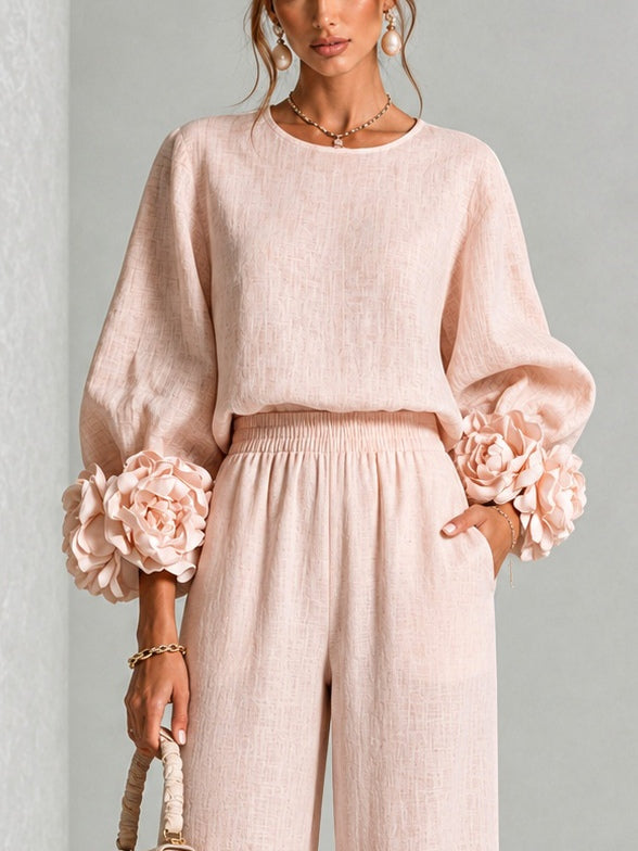 Ensemble deux pièces Danoir Paris avec manches florales roses, vêtement élégant en tissu léger, style féminin et chic.