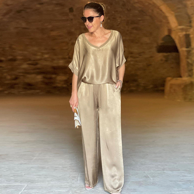 Ensemble en satin brillant Pauline de Danoir Paris, vêtement élégant vert XS avec finition lustrée.