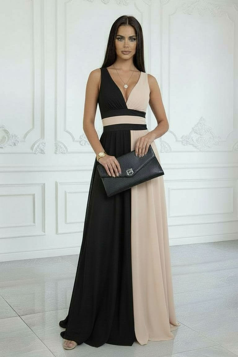 Robe élégante Laura de Danoir Paris, vêtement chic en tissu fluide, porté en style sophistiqué pour occasion spéciale.