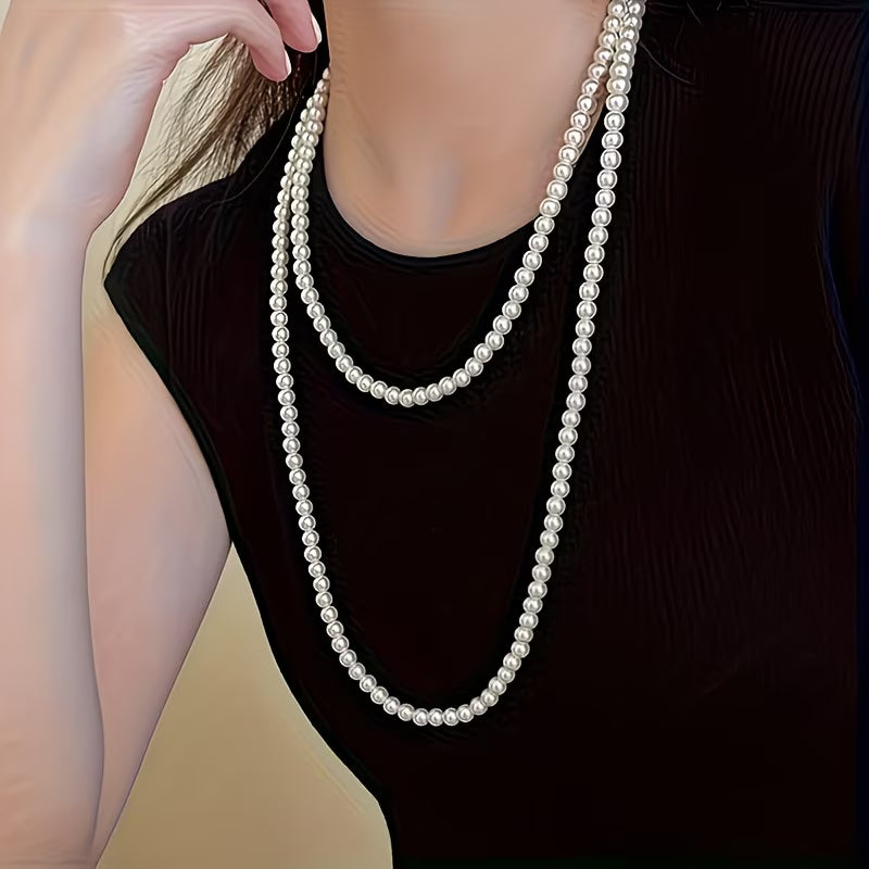 Collier double de perles intemporel de la collection Danoir Paris, avec perles élégantes et finition raffinée.