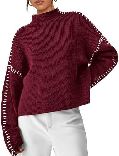 Pull confortable Danoir Paris Nia pour automne, en tissu doux, couleur noire, porté pour un look décontracté et chaud.