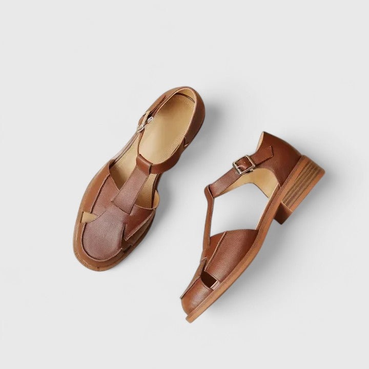 Faustine™ Babies découpes latérales de Danoir Paris, vêtements beige pour bébés avec détails décoratifs.