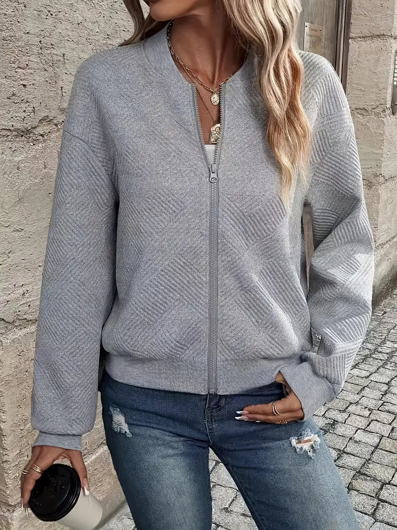 Veste printanière élégante Jennita de Danoir Paris en beige, vue de face avec col et manches longues.