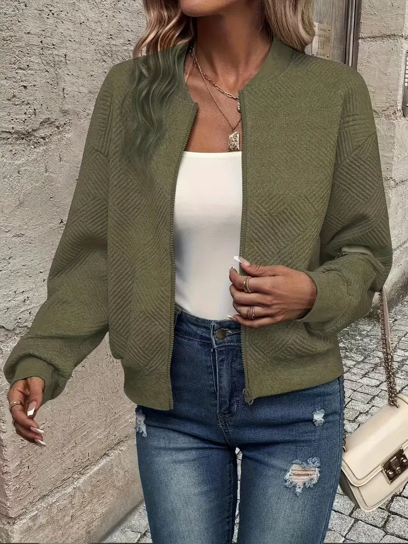 Veste printanière élégante Jennita de Danoir Paris en beige, vue de face sur un fond neutre.