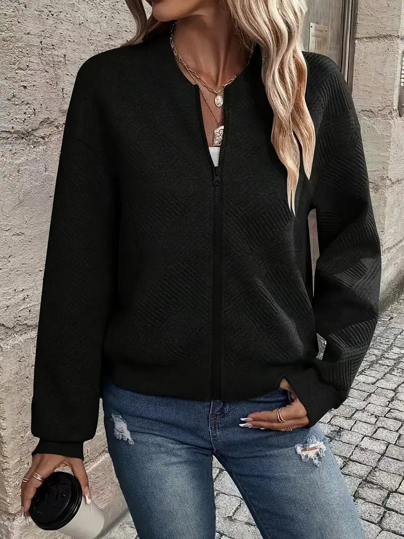Veste printanière beige élégante Jennita de Danoir Paris, vue de face, détails du tissu et coupe sophistiquée.