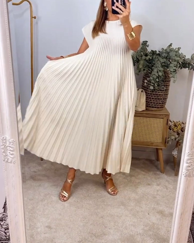 Robe longue élégante Sylvie de Danoir Paris en beige, vue de face, tissu fluide et design sophistiqué.