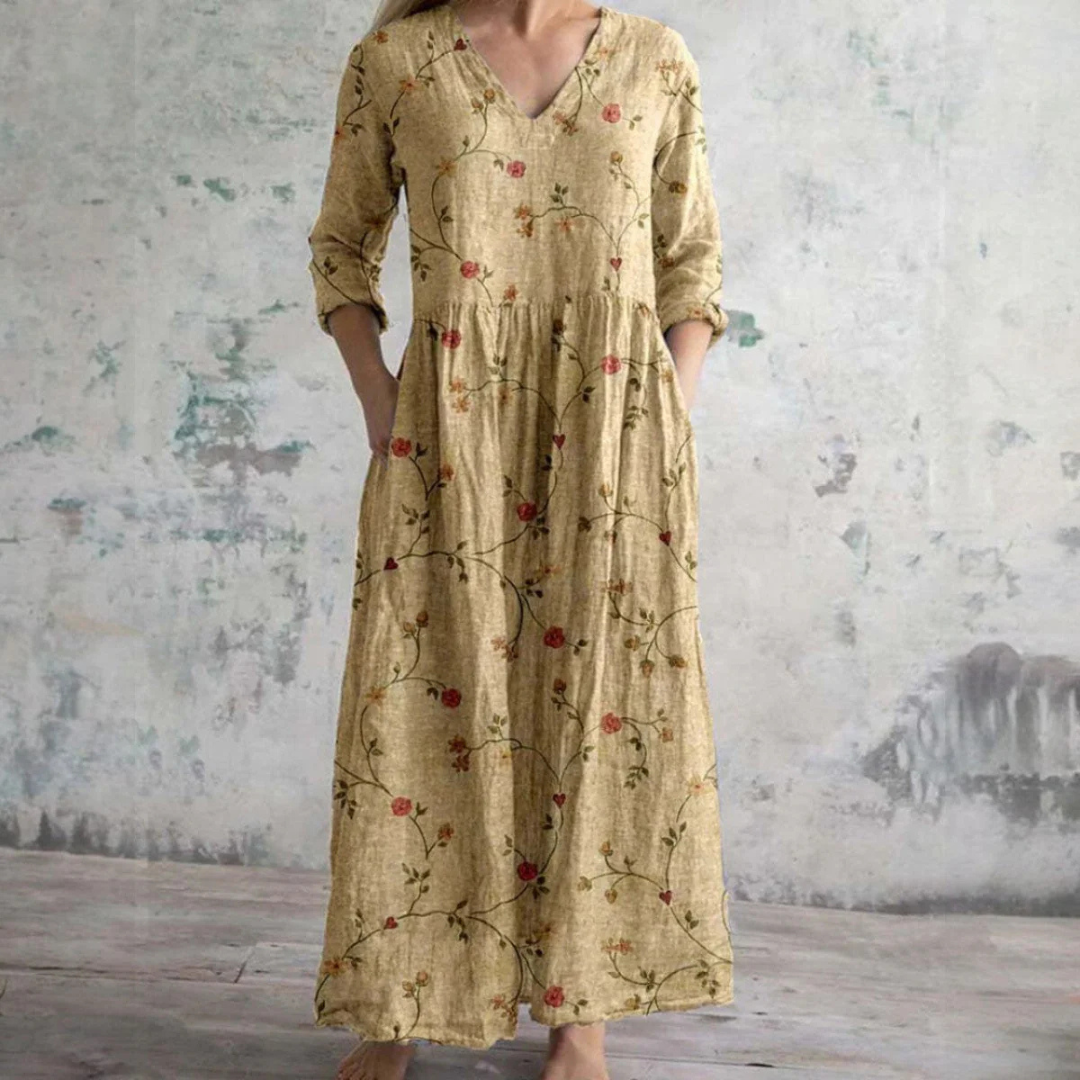 Robe aérienne florale Tamara de Danoir Paris en tissu beige avec motif floral léger.