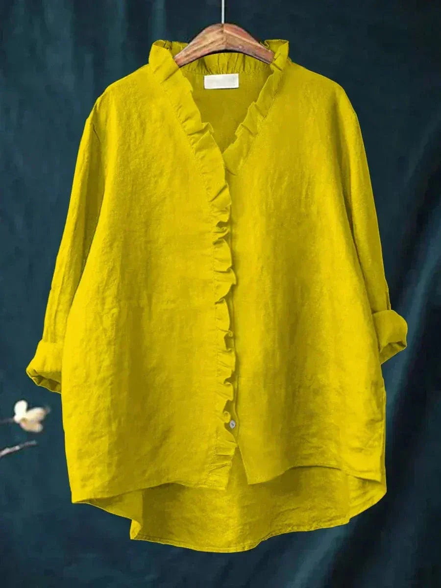 Blouse d'été élégante en lin blanche Eline de Danoir Paris, vue de face avec détails légers et tissu fluide.