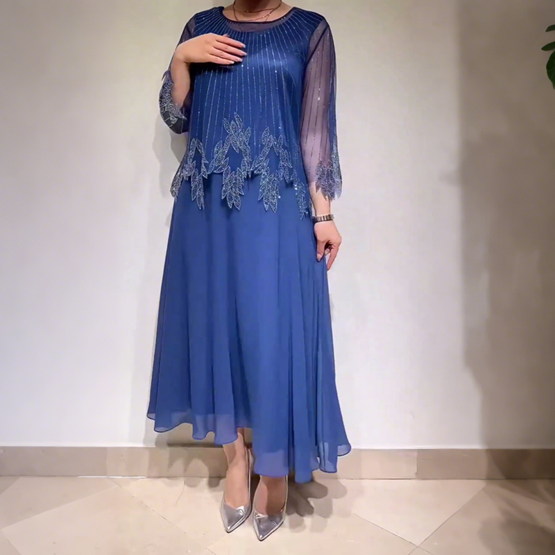 Robe mi-longue décontractée élégante Danoir Paris noire, style chic et confortable pour un look casual.