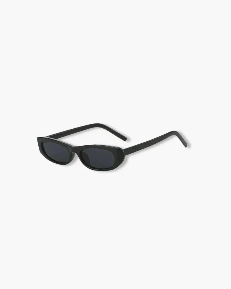 Lunettes de soleil ovales Sylvie de Danoir Paris en noir, vue de face, avec monture élégante et design moderne.