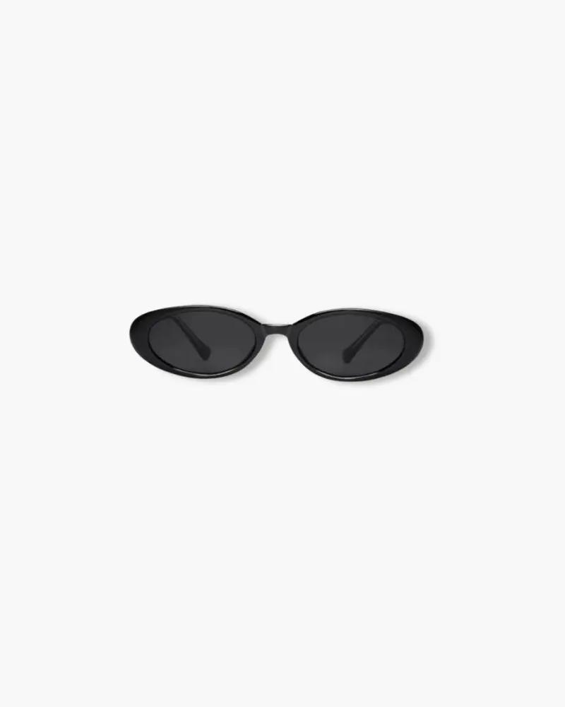 Lunettes de soleil ovales Sylvie de Danoir Paris en noir, avec monture élégante et design moderne visible dans l’image.