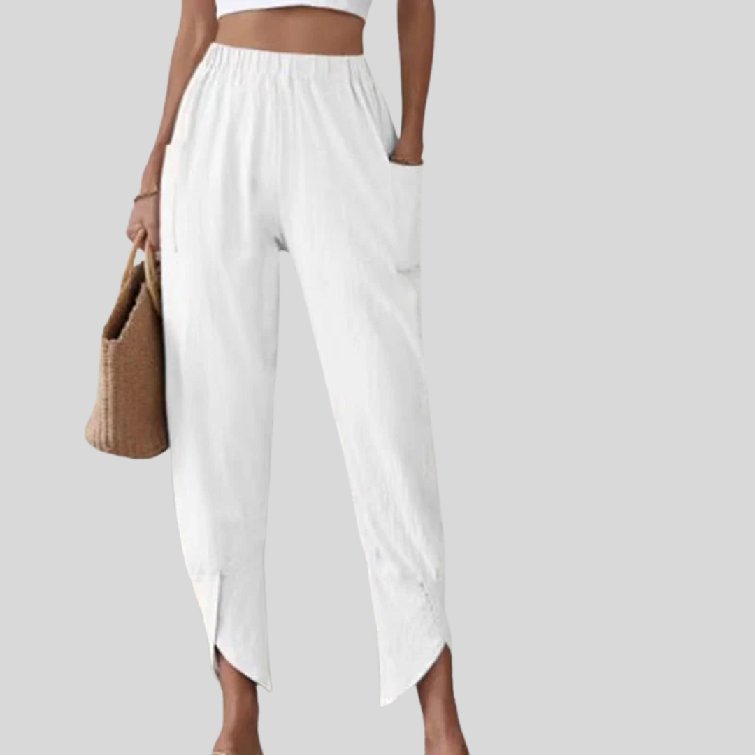 Pantalons à ourlet effiloché Essari Danoir Paris en tissu blanc, style décontracté et tendance, image de pantalon avec ourlet effiloché.
