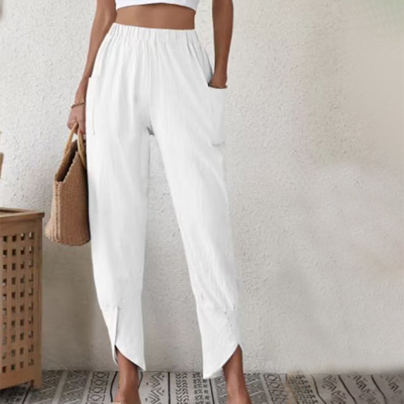 Pantalons à ourlet effiloché Essari Danoir Paris en tissu blanc, mode décontractée et tendance, vue de face.